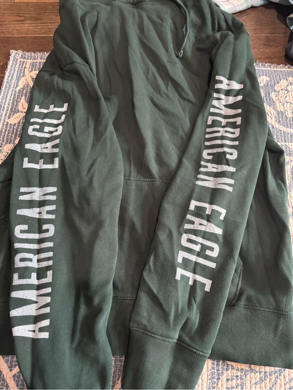 American Eagle Outfitters Dark Green Hoodie with White Sleeve Lettering